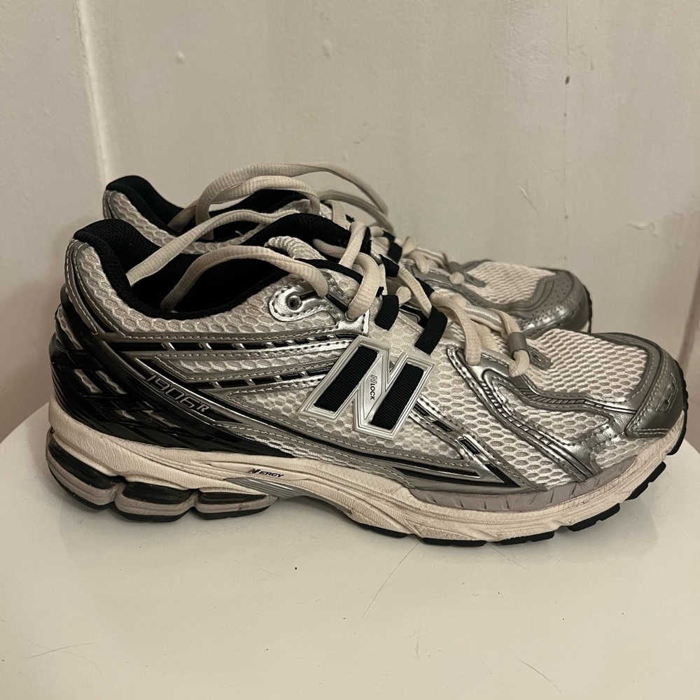 New Balance 1906R sneakers in the Silver Metallic and Black colorway. Size 10.